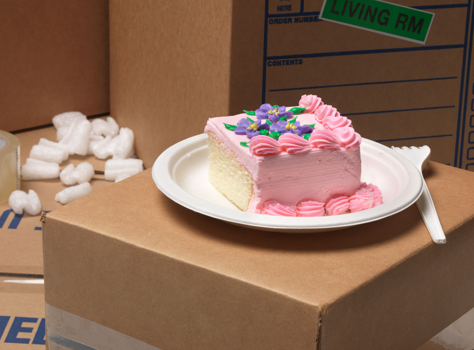 cake on moving boxes treat for working hard