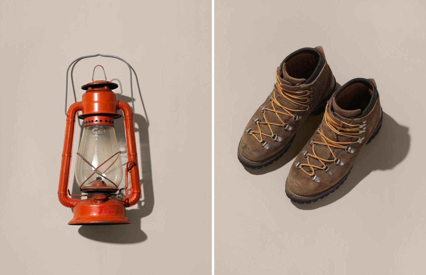 old lantern and a worn pair of hiking boots