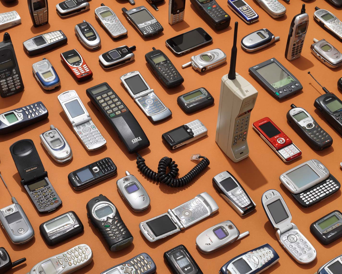 vintage cell phones organized neatly