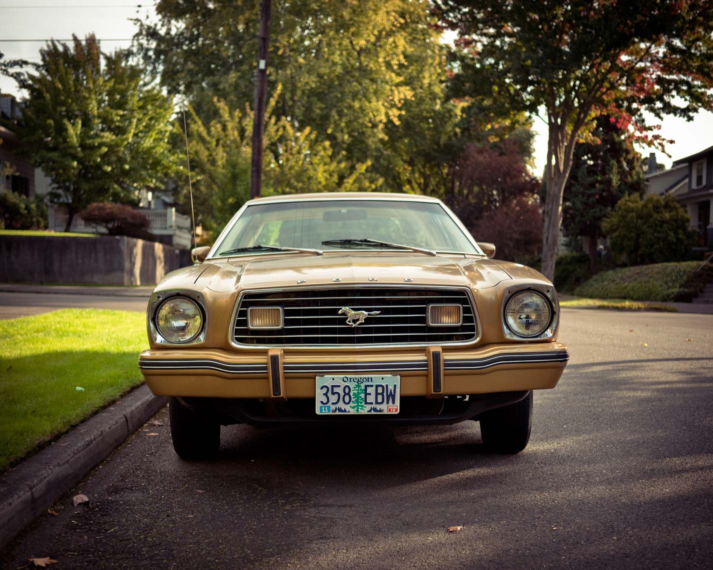 ford mustang two ghia edition gold