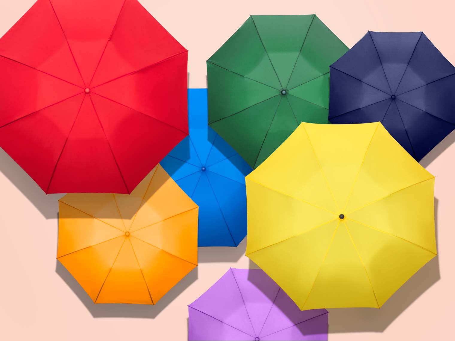 colorful umbrellas arranged in a graphic pattern