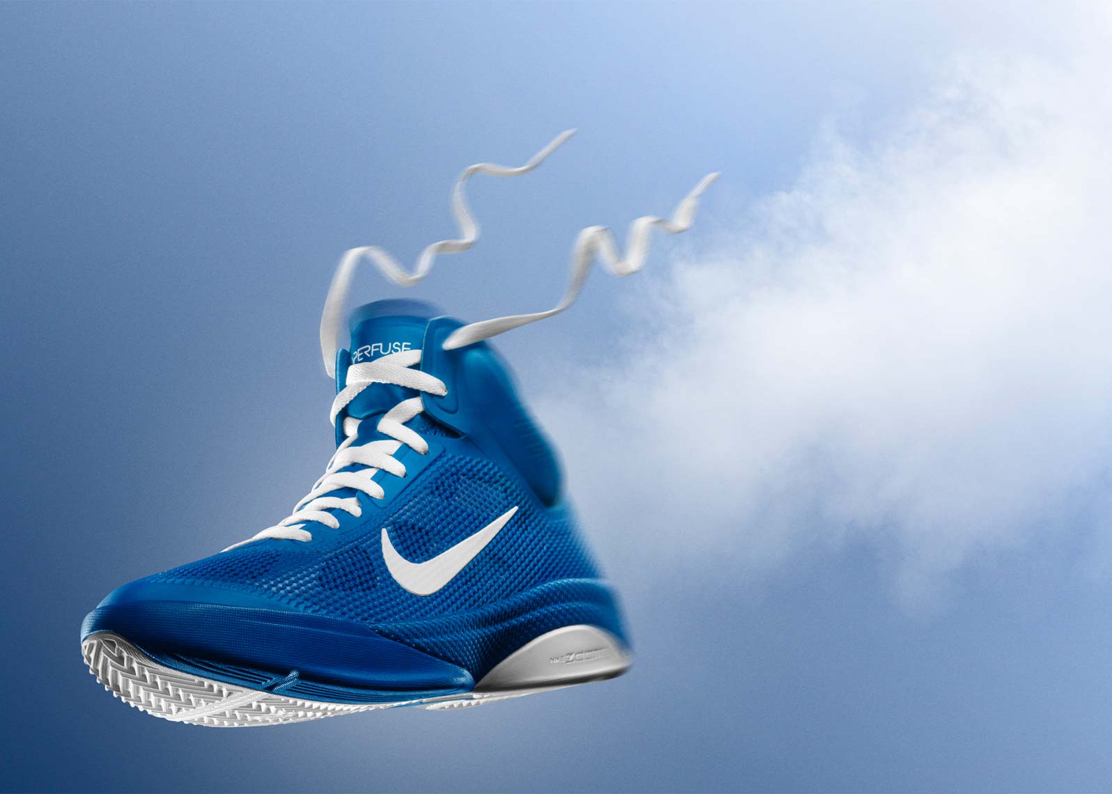 nike basketball hyperfuse shoe on blue background