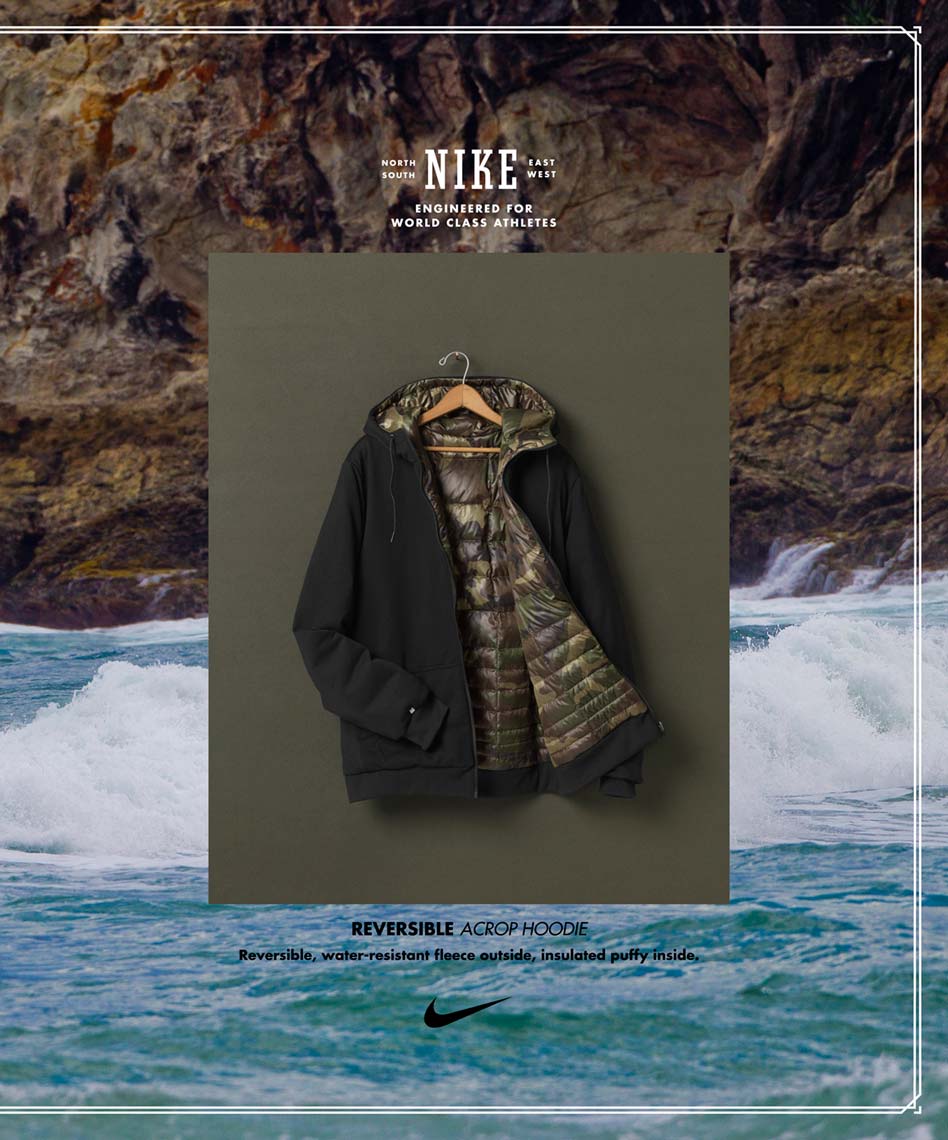 nike surf jacket hanging in front of a clean photo