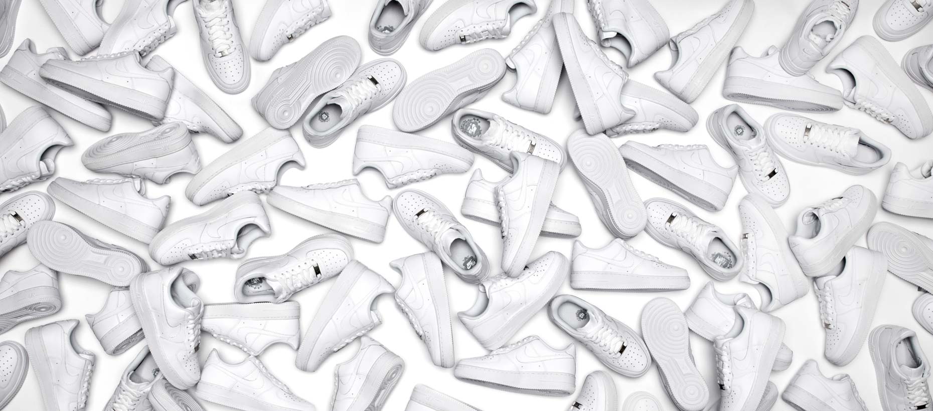 pile of all white nike air force 1