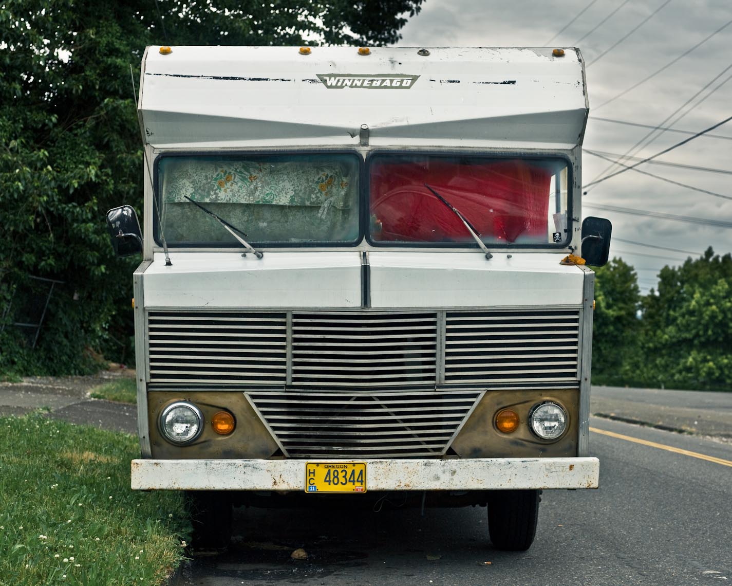 beater winnebago Rv on the street