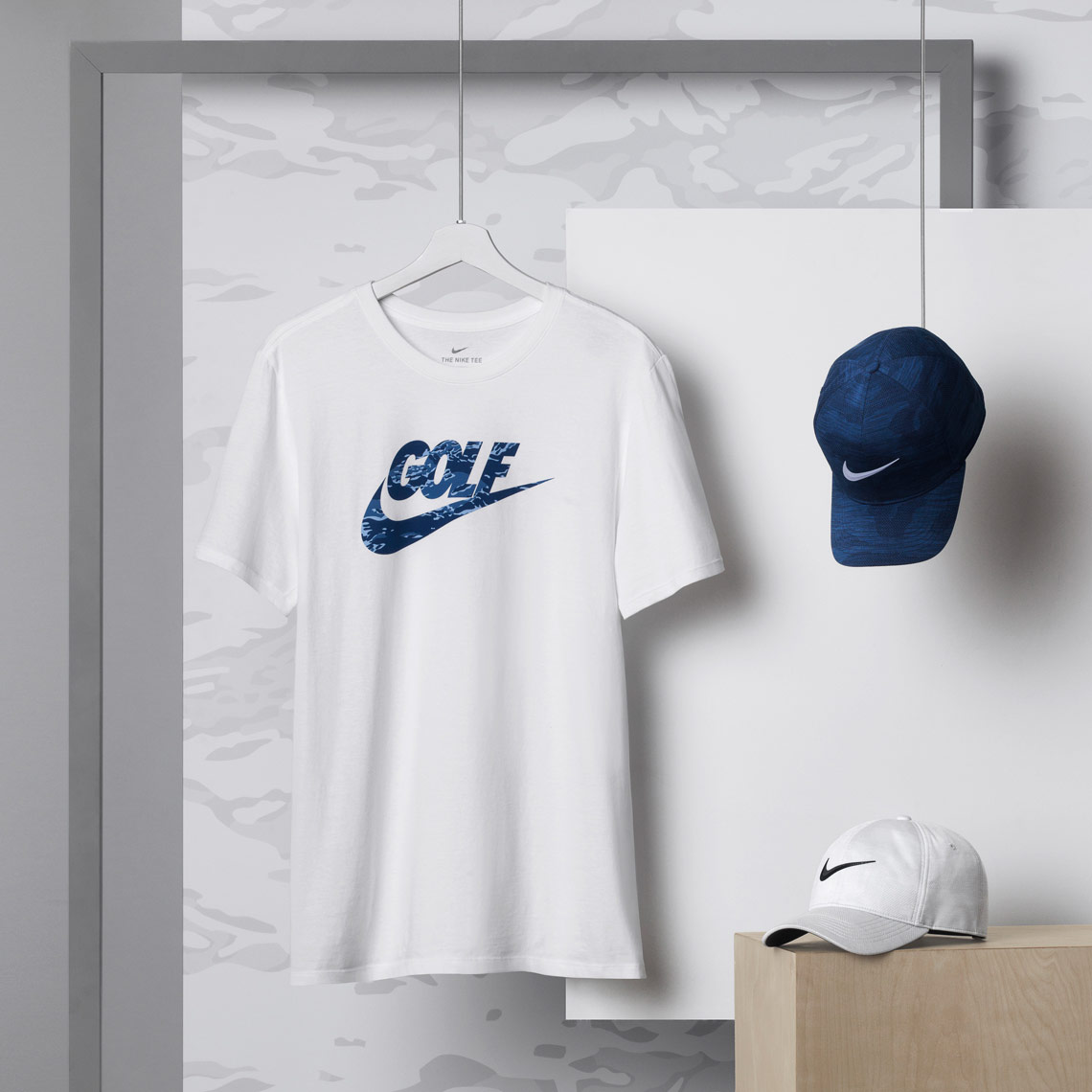 nike golf apparel on white grey camp background